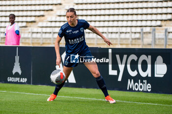 2024-05-17 - Louise Fleury of Paris FC controls the ball during the Women's French championship, Play-offs, 3rd place football match between Paris FC and Stade de Reims on May 17, 2024 at Sébastien Charléty stadium in Paris, France - FOOTBALL - WOMEN'S FRENCH CHAMP - 3RD PLACE - PARIS FC V REIMS - FRENCH WOMEN DIVISION 1 - SOCCER