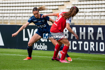 2024-05-17 - Louise Fleury of Paris FC and Rachel Corboz of Stade de Reims fight for the ball during the Women's French championship, Play-offs, 3rd place football match between Paris FC and Stade de Reims on May 17, 2024 at Sébastien Charléty stadium in Paris, France - FOOTBALL - WOMEN'S FRENCH CHAMP - 3RD PLACE - PARIS FC V REIMS - FRENCH WOMEN DIVISION 1 - SOCCER