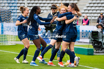 2024-05-17 - Celina Ould Hocine of Paris FC and Louna Ribadeira of Paris FC celebrate the victory after the Women's French championship, Play-offs, 3rd place football match between Paris FC and Stade de Reims on May 17, 2024 at Sébastien Charléty stadium in Paris, France - FOOTBALL - WOMEN'S FRENCH CHAMP - 3RD PLACE - PARIS FC V REIMS - FRENCH WOMEN DIVISION 1 - SOCCER