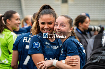 2024-05-17 - Louna Ribadeira of Paris FC and Margaux Le Mouel of Paris FC celebrate the victory after the Women's French championship, Play-offs, 3rd place football match between Paris FC and Stade de Reims on May 17, 2024 at Sébastien Charléty stadium in Paris, France - FOOTBALL - WOMEN'S FRENCH CHAMP - 3RD PLACE - PARIS FC V REIMS - FRENCH WOMEN DIVISION 1 - SOCCER