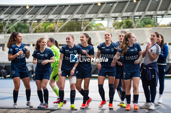 2024-05-17 - The players of Paris FC celebrate the victory after the Women's French championship, Play-offs, 3rd place football match between Paris FC and Stade de Reims on May 17, 2024 at Sébastien Charléty stadium in Paris, France - FOOTBALL - WOMEN'S FRENCH CHAMP - 3RD PLACE - PARIS FC V REIMS - FRENCH WOMEN DIVISION 1 - SOCCER