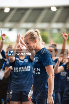 2024-05-17 - Julie Soyer of Paris FC celebrates the victory after the Women's French championship, Play-offs, 3rd place football match between Paris FC and Stade de Reims on May 17, 2024 at Sébastien Charléty stadium in Paris, France - FOOTBALL - WOMEN'S FRENCH CHAMP - 3RD PLACE - PARIS FC V REIMS - FRENCH WOMEN DIVISION 1 - SOCCER