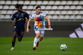 2024-10-12 - Monique Ngock of Stade de Reims and Kaja Korosec of Paris FC fight for the ball during the French championship, Arkema Premier Ligue football match between Paris FC and Stade de Reims on 12 October 2024 at Sebastien Charlety stadium in Paris, France - FOOTBALL - WOMEN'S FRENCH CHAMP - PARIS FC V REIMS - FRENCH WOMEN DIVISION 1 - SOCCER