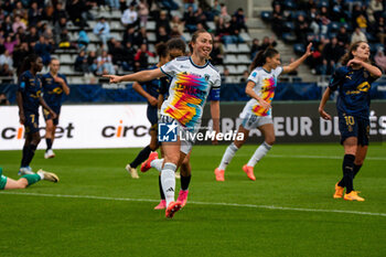 2024-10-12 - Gaetane Thiney of Paris FC celebrates after scoring during the French championship, Arkema Premier Ligue football match between Paris FC and Stade de Reims on 12 October 2024 at Sebastien Charlety stadium in Paris, France - FOOTBALL - WOMEN'S FRENCH CHAMP - PARIS FC V REIMS - FRENCH WOMEN DIVISION 1 - SOCCER