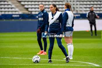 2024-10-12 - Kessya Bussy of Paris FC warms up ahead of ahead of the French championship, Arkema Premier Ligue football match between Paris FC and Stade de Reims on 12 October 2024 at Sebastien Charlety stadium in Paris, France - FOOTBALL - WOMEN'S FRENCH CHAMP - PARIS FC V REIMS - FRENCH WOMEN DIVISION 1 - SOCCER