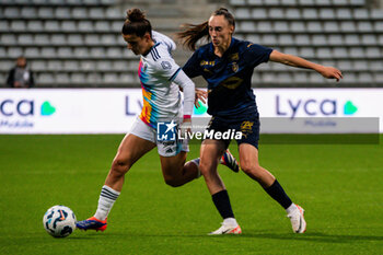 2024-10-12 - Mathilde Bourdieu of Paris FC and Maite Boucly of Stade de Reims fight for the ball during the French championship, Arkema Premier Ligue football match between Paris FC and Stade de Reims on 12 October 2024 at Sebastien Charlety stadium in Paris, France - FOOTBALL - WOMEN'S FRENCH CHAMP - PARIS FC V REIMS - FRENCH WOMEN DIVISION 1 - SOCCER