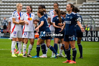 2024-10-20 - Ada Hegerberg of Olympique Lyonnais, Vanessa Gilles of Olympique Lyonnais and Gaetane Thiney of Paris FC fight for the ball during the Women's French championship, Arkema Premier Ligue football match between Paris FC and Olympique Lyonnais on 20 October 2024 at Sebastien Charlety stadium in Paris, France - FOOTBALL - WOMEN'S FRENCH CHAMP - PARIS FC V LYON - FRENCH WOMEN DIVISION 1 - SOCCER