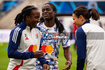 2024-10-20 - Vicki Becho of Olympique Lyonnais, Tabitha Chawinga of Olympique Lyonnais and Dzsenifer Marozsan of Olympique Lyonnais warm up ahead of the Women's French championship, Arkema Premier Ligue football match between Paris FC and Olympique Lyonnais on 20 October 2024 at Sebastien Charlety stadium in Paris, France - FOOTBALL - WOMEN'S FRENCH CHAMP - PARIS FC V LYON - FRENCH WOMEN DIVISION 1 - SOCCER