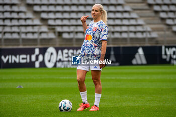 2024-10-20 - Lindsey Horan of Olympique Lyonnais warms up ahead of the Women's French championship, Arkema Premier Ligue football match between Paris FC and Olympique Lyonnais on 20 October 2024 at Sebastien Charlety stadium in Paris, France - FOOTBALL - WOMEN'S FRENCH CHAMP - PARIS FC V LYON - FRENCH WOMEN DIVISION 1 - SOCCER