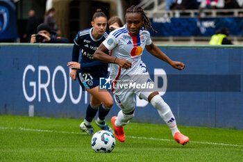 2024-10-20 - Maelle Garbino of Paris FC and Melchie Dumornay of Olympique Lyonnais fight for the ball during the Women's French championship, Arkema Premier Ligue football match between Paris FC and Olympique Lyonnais on 20 October 2024 at Sebastien Charlety stadium in Paris, France - FOOTBALL - WOMEN'S FRENCH CHAMP - PARIS FC V LYON - FRENCH WOMEN DIVISION 1 - SOCCER