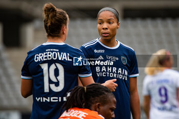 2024-10-20 - Thea Greboval of Paris FC and Deja Davis of Paris FC during the Women's French championship, Arkema Premier Ligue football match between Paris FC and Olympique Lyonnais on 20 October 2024 at Sebastien Charlety stadium in Paris, France - FOOTBALL - WOMEN'S FRENCH CHAMP - PARIS FC V LYON - FRENCH WOMEN DIVISION 1 - SOCCER