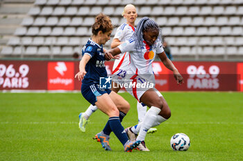 2024-10-20 - Daphne Corboz of Paris FC and Kadidiatou Diani of Olympique Lyonnais fight for the ball during the Women's French championship, Arkema Premier Ligue football match between Paris FC and Olympique Lyonnais on 20 October 2024 at Sebastien Charlety stadium in Paris, France - FOOTBALL - WOMEN'S FRENCH CHAMP - PARIS FC V LYON - FRENCH WOMEN DIVISION 1 - SOCCER