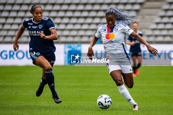 2024-10-20 - Deja Davis of Paris FC and Kadidiatou Diani of Olympique Lyonnais fight for the ball during the Women's French championship, Arkema Premier Ligue football match between Paris FC and Olympique Lyonnais on 20 October 2024 at Sebastien Charlety stadium in Paris, France - FOOTBALL - WOMEN'S FRENCH CHAMP - PARIS FC V LYON - FRENCH WOMEN DIVISION 1 - SOCCER