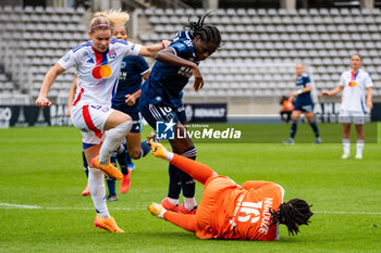 2024-10-20 - Eugenie Le Sommer of Olympique Lyonnais and Melwenn N Dongala of Paris FC fight for the ball during the Women's French championship, Arkema Premier Ligue football match between Paris FC and Olympique Lyonnais on 20 October 2024 at Sebastien Charlety stadium in Paris, France - FOOTBALL - WOMEN'S FRENCH CHAMP - PARIS FC V LYON - FRENCH WOMEN DIVISION 1 - SOCCER