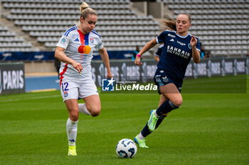 2024-10-20 - Ellie Carpenter of Olympique Lyonnais and Lou Bogaert of Paris FC fight for the ball during the Women's French championship, Arkema Premier Ligue football match between Paris FC and Olympique Lyonnais on 20 October 2024 at Sebastien Charlety stadium in Paris, France - FOOTBALL - WOMEN'S FRENCH CHAMP - PARIS FC V LYON - FRENCH WOMEN DIVISION 1 - SOCCER