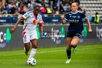 2024-10-20 - Kadidiatou Diani of Olympique Lyonnais and Lou Bogaert of Paris FC fight for the ball during the Women's French championship, Arkema Premier Ligue football match between Paris FC and Olympique Lyonnais on 20 October 2024 at Sebastien Charlety stadium in Paris, France - FOOTBALL - WOMEN'S FRENCH CHAMP - PARIS FC V LYON - FRENCH WOMEN DIVISION 1 - SOCCER