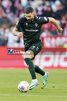 2024-01-21 - Anthony Jung of Werder Bremen during the German championship Bundesliga football match between Bayern Munich and Werder Bremen on January 21, 2024 at Allianz Arena in Munich, Germany - FOOTBALL - GERMAN CHAMP - BAYERN MUNICH V WERDER BREMEN - GERMAN BUNDESLIGA - SOCCER