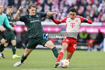 2024-01-21 - Jens Stage of Werder Bremen and Jamal Musiala of Bayern Munich during the German championship Bundesliga football match between Bayern Munich and Werder Bremen on January 21, 2024 at Allianz Arena in Munich, Germany - FOOTBALL - GERMAN CHAMP - BAYERN MUNICH V WERDER BREMEN - GERMAN BUNDESLIGA - SOCCER