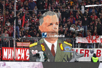 2024-01-24 - Bayern Munich fans display a banner to mock Union Berlin president Dirk Zingler, he is drawn with a pig's nose and in a Stasi uniform during the German championship Bundesliga football match between Bayern Munich and Union Berlin on January 24, 2024 at Allianz Arena in Munich, Germany - FOOTBALL - GERMAN CHAMP - BAYERN MUNICH V UNION BERLIN - GERMAN BUNDESLIGA - SOCCER