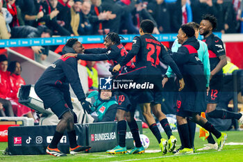 2024-02-10 - Jeremie Frimpong of Bayer 04 Leverkusen celebrates his goal 3-0 with teammates during the German championship Bundesliga football match between Bayer 04 Leverkusen and Bayern Munich on February 10, 2024 at BayArena in Leverkusen, Germany - FOOTBALL - GERMAN CHAMP - BAYER LEVERKUSEN V BAYERN MUNICH - GERMAN BUNDESLIGA - SOCCER