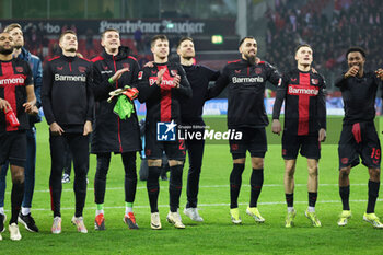 2024-02-10 - Coach Xabi Alonso with players of Bayer 04 Leverkusen celebrate at full time during the German championship Bundesliga football match between Bayer 04 Leverkusen and Bayern Munich on February 10, 2024 at BayArena in Leverkusen, Germany - FOOTBALL - GERMAN CHAMP - BAYER LEVERKUSEN V BAYERN MUNICH - GERMAN BUNDESLIGA - SOCCER