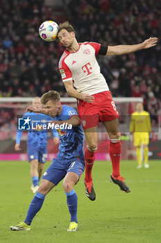 2024-02-24 - Leon Goretzka of Bayern Munich and Dani Olmo of RB Leipzig during the German championship Bundesliga football match between Bayern Munich and RB Leipzig on February 24, 2024 at Allianz Arena in Munich, Germany - FOOTBALL - GERMAN CHAMP - BAYERN MUNICH V LEIPZIG - GERMAN BUNDESLIGA - SOCCER
