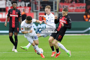 2024-03-30 - Florian Wirtz of Leverkusen and Umut Tohumcu, Maximilian Beier of Hoffenheim during the German championship Bundesliga football match between Bayer 04 Leverkusen and TSG Hoffenheim on March 30, 2024 at BayArena in Leverkusen, Germany - FOOTBALL - GERMAN CHAMP - LEVERKUSEN V HOFFENHEIM - GERMAN BUNDESLIGA - SOCCER