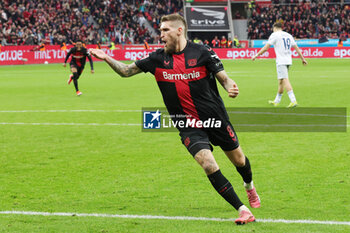 2024-03-30 - Robert Andrich of Leverkusen celebrates his goal 1-1 during the German championship Bundesliga football match between Bayer 04 Leverkusen and TSG Hoffenheim on March 30, 2024 at BayArena in Leverkusen, Germany - FOOTBALL - GERMAN CHAMP - LEVERKUSEN V HOFFENHEIM - GERMAN BUNDESLIGA - SOCCER