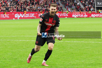 2024-03-30 - Robert Andrich of Leverkusen celebrates his goal 1-1 during the German championship Bundesliga football match between Bayer 04 Leverkusen and TSG Hoffenheim on March 30, 2024 at BayArena in Leverkusen, Germany - FOOTBALL - GERMAN CHAMP - LEVERKUSEN V HOFFENHEIM - GERMAN BUNDESLIGA - SOCCER