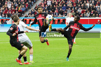 2024-03-30 - Amine Adli and Jeremie Frimpong of Leverkusen during the German championship Bundesliga football match between Bayer 04 Leverkusen and TSG Hoffenheim on March 30, 2024 at BayArena in Leverkusen, Germany - FOOTBALL - GERMAN CHAMP - LEVERKUSEN V HOFFENHEIM - GERMAN BUNDESLIGA - SOCCER