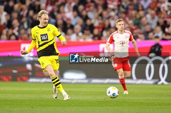 2024-03-30 - Julian Brandt of Borussia Dortmund during the German championship Bundesliga football match between Bayern Munich and Borussia Dortmund on March 30, 2024 at Allianz Arena in Munich, Germany - FOOTBALL - GERMAN CHAMP - BAYERN MUNICH V DORTMUND - GERMAN BUNDESLIGA - SOCCER