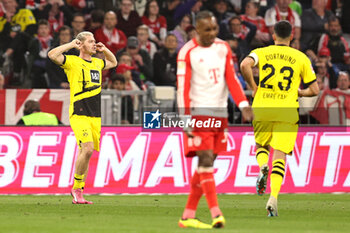 2024-03-30 - Julian Ryerson of Borussia Dortmund celebrates his goal 0-2 during the German championship Bundesliga football match between Bayern Munich and Borussia Dortmund on March 30, 2024 at Allianz Arena in Munich, Germany - FOOTBALL - GERMAN CHAMP - BAYERN MUNICH V DORTMUND - GERMAN BUNDESLIGA - SOCCER