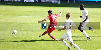 2024-04-06 - Kevin Sessa of Heidenheim scores a goal 1-2 during the German championship Bundesliga football match between FC Heidenheim and FC Bayern Munich on April 6, 2024 at Voith Arena in Heidenheim, Germany - FOOTBALL - GERMAN CHAMP - HEIDENHEIM V BAYERN MUNICH - GERMAN BUNDESLIGA - SOCCER