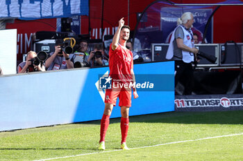 2024-04-06 - Tim Kleindienst of Heidenheim celebrates his goal 2-2 during the German championship Bundesliga football match between FC Heidenheim and FC Bayern Munich on April 6, 2024 at Voith Arena in Heidenheim, Germany - FOOTBALL - GERMAN CHAMP - HEIDENHEIM V BAYERN MUNICH - GERMAN BUNDESLIGA - SOCCER