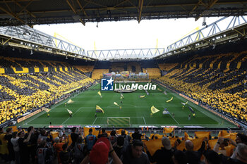 2024-04-06 - Fans of Borussia Dortmund, tifo during the German championship Bundesliga football match between Borussia Dortmund and VfB Stuttgart on April 6, 2024 at Signal Iduna Park in Dortmund , Germany - FOOTBALL - GERMAN CHAMP - DORTMUND V STUTTGART - GERMAN BUNDESLIGA - SOCCER