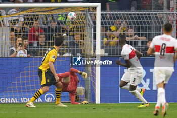 2024-04-06 - Serhou Guirassy of Stuttgart scores a goal 0-1 during the German championship Bundesliga football match between Borussia Dortmund and VfB Stuttgart on April 6, 2024 at Signal Iduna Park in Dortmund , Germany - FOOTBALL - GERMAN CHAMP - DORTMUND V STUTTGART - GERMAN BUNDESLIGA - SOCCER