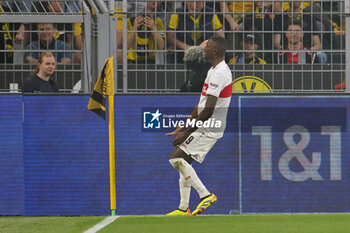 2024-04-06 - Serhou Guirassy of Stuttgart celebrates his goal 0-1 during the German championship Bundesliga football match between Borussia Dortmund and VfB Stuttgart on April 6, 2024 at Signal Iduna Park in Dortmund , Germany - FOOTBALL - GERMAN CHAMP - DORTMUND V STUTTGART - GERMAN BUNDESLIGA - SOCCER