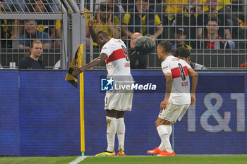 2024-04-06 - Serhou Guirassy of Stuttgart celebrates his goal 0-1 during the German championship Bundesliga football match between Borussia Dortmund and VfB Stuttgart on April 6, 2024 at Signal Iduna Park in Dortmund , Germany - FOOTBALL - GERMAN CHAMP - DORTMUND V STUTTGART - GERMAN BUNDESLIGA - SOCCER