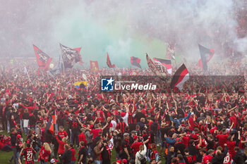 2024-04-14 - Leverkusen fans celebrate German league title 2024 following the German championship Bundesliga football match between Bayer Leverkusen and Werder Bremen on April 14, 2024 at BayArena in Leverkusen, Germany - FOOTBALL - GERMAN CHAMP - LEVERKUSEN V BREMEN - GERMAN BUNDESLIGA - SOCCER