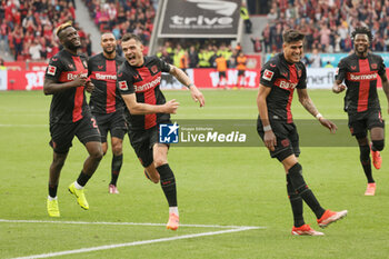 2024-04-14 - Granit Xhaka of Bayer Leverkusen celebrates his goal 2-0 during the German championship Bundesliga football match between Bayer Leverkusen and Werder Bremen on April 14, 2024 at BayArena in Leverkusen, Germany - FOOTBALL - GERMAN CHAMP - LEVERKUSEN V BREMEN - GERMAN BUNDESLIGA - SOCCER