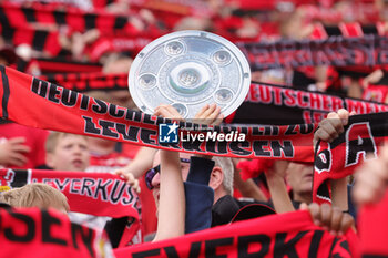 2024-04-14 - Leverkusen fans celebrate German league title 2024 during the German championship Bundesliga football match between Bayer Leverkusen and Werder Bremen on April 14, 2024 at BayArena in Leverkusen, Germany - FOOTBALL - GERMAN CHAMP - LEVERKUSEN V BREMEN - GERMAN BUNDESLIGA - SOCCER