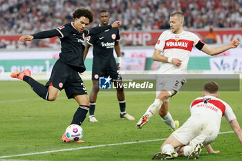 2024-04-13 - Nnamdi Collins of Eintracht Frankfurt and Waldemar Anton of Stuttgart during the German championship Bundesliga football match between VfB Stuttgart and Eintracht Frankfurt on April 13, 2024 at MHPArena in Stuttgart, Germany - FOOTBALL - GERMAN CHAMP - STUTTGART V FRANKFURT - GERMAN BUNDESLIGA - SOCCER