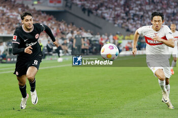 2024-04-13 - Fares Chaibi of Eintracht Frankfurt and Woo-yeong Jeong of Stuttgart during the German championship Bundesliga football match between VfB Stuttgart and Eintracht Frankfurt on April 13, 2024 at MHPArena in Stuttgart, Germany - FOOTBALL - GERMAN CHAMP - STUTTGART V FRANKFURT - GERMAN BUNDESLIGA - SOCCER