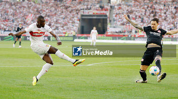 2024-04-13 - Serhou Guirassy of Stuttgart and Robin Koch of Eintracht Frankfurt during the German championship Bundesliga football match between VfB Stuttgart and Eintracht Frankfurt on April 13, 2024 at MHPArena in Stuttgart, Germany - FOOTBALL - GERMAN CHAMP - STUTTGART V FRANKFURT - GERMAN BUNDESLIGA - SOCCER