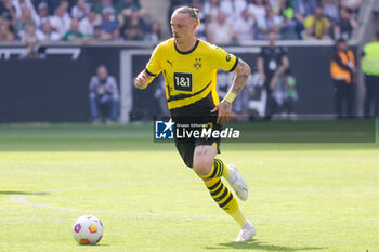 2024-04-13 - Marius Wolf of Borussia Dortmund during the German championship Bundesliga football match between Borussia Mönchengladbach and Borussia Dortmund on April 13, 2024 at Borussia-Park in Mönchengladbach, Germany - FOOTBALL - GERMAN CHAMP - MONCHENGLADBACH V DORTMUND - GERMAN BUNDESLIGA - SOCCER