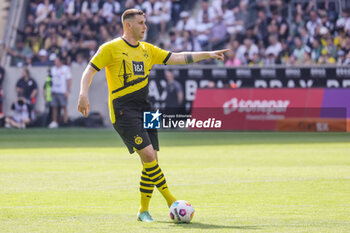 2024-04-13 - Niklas Süle of Borussia Dortmund during the German championship Bundesliga football match between Borussia Mönchengladbach and Borussia Dortmund on April 13, 2024 at Borussia-Park in Mönchengladbach, Germany - FOOTBALL - GERMAN CHAMP - MONCHENGLADBACH V DORTMUND - GERMAN BUNDESLIGA - SOCCER