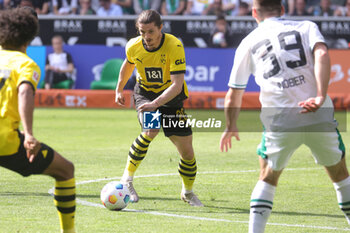 2024-04-13 - Marcel Sabitzer of Borussia Dortmund during the German championship Bundesliga football match between Borussia Mönchengladbach and Borussia Dortmund on April 13, 2024 at Borussia-Park in Mönchengladbach, Germany - FOOTBALL - GERMAN CHAMP - MONCHENGLADBACH V DORTMUND - GERMAN BUNDESLIGA - SOCCER