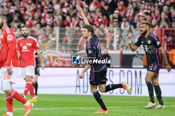 2024-04-20 - Thomas Müller of Bayern Munich celebrates his goal 0-5 during the German championship Bundesliga football match between Union Berlin and Bayern Munich on April 20, 2024 at An der Alten Försterei stadium in Berlin, Germany - FOOTBALL - GERMAN CHAMP - UNION BERLIN V BAYERN MUNICH - GERMAN BUNDESLIGA - SOCCER