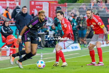 2024-04-20 - Eric-Maxim Choupo-Moting of Bayern Munich and Brenden Aaronson, Christopher Trimmel of Union Berlin during the German championship Bundesliga football match between Union Berlin and Bayern Munich on April 20, 2024 at An der Alten Försterei stadium in Berlin, Germany - FOOTBALL - GERMAN CHAMP - UNION BERLIN V BAYERN MUNICH - GERMAN BUNDESLIGA - SOCCER