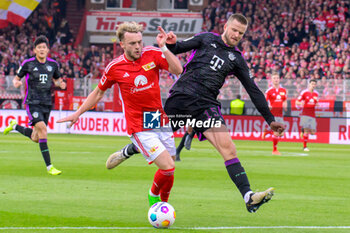 2024-04-20 - Benedict Hollerbach of Union Berlin and Eric Dier of Bayern Munich during the German championship Bundesliga football match between Union Berlin and Bayern Munich on April 20, 2024 at An der Alten Försterei stadium in Berlin, Germany - FOOTBALL - GERMAN CHAMP - UNION BERLIN V BAYERN MUNICH - GERMAN BUNDESLIGA - SOCCER